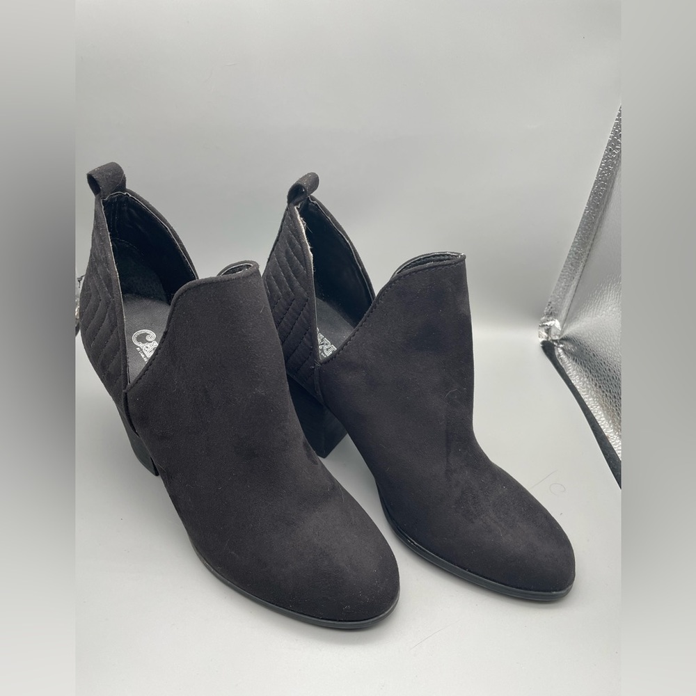 Women’s black pant boots by Carlos. Brand new. Size 7 AC046